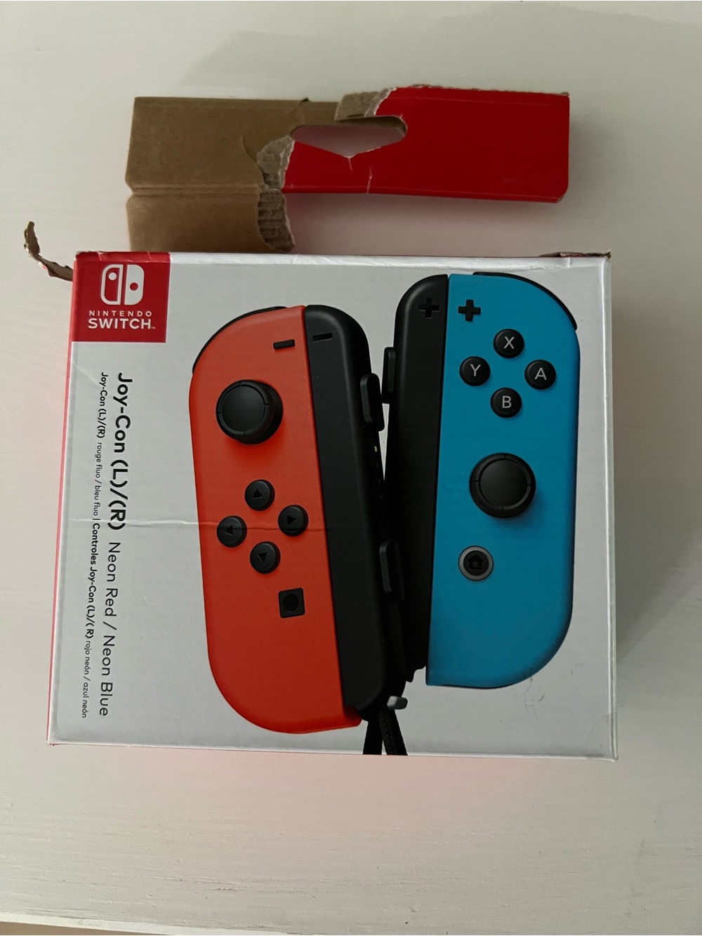 New in Box Nintendo Neon Red and Neon Blue Joy-Con Controller